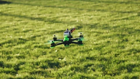 The drone flies low above the ground and removes the environment Stock Footage 162831121