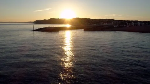 Drone flies low level towards harbor of West Bay Stock Footage 94366768
