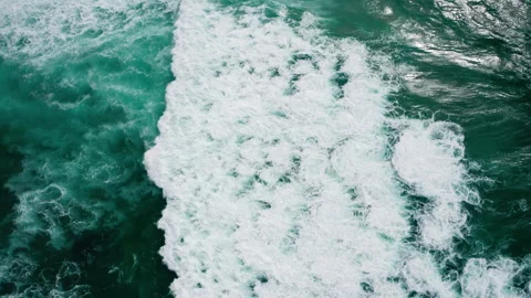 Drone  flies low over closer the ocean waves, in summer day. Aerial view na.. Stock Footage 328738704