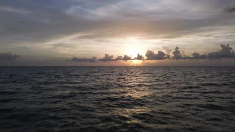 Drone Flies Low Over Gulf of Mexico Waves, Golden Hour Sunset Stock Footage 345962922