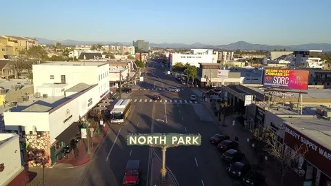 Drone flies low over NORTH PARK sign in San Diego facing East Stock Footage 102821872