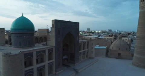 The drone flies near the main gate of the architectural complex Poi-Kalon. Early Stock Footage 255440799
