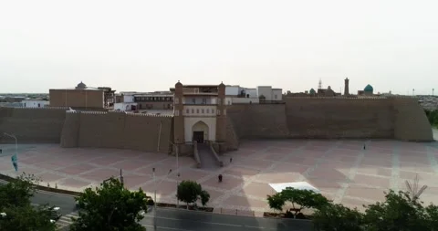 A drone flies near the main gate of the ancient Ark fortress complex in old Stock Footage 271165627