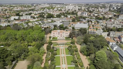 Drone flies north over Parque da Serralves on sunny day in Porto, Portugal 库存影片 309660944