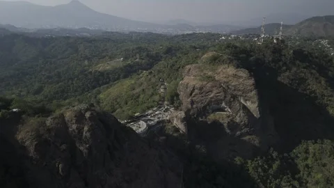 Drone flies northwest over the Devil's Door rock formation Stock Footage 306088363