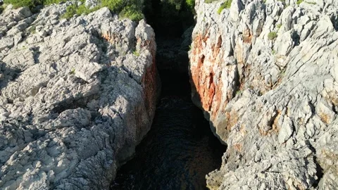 A drone flies out of the gorge Stock Footage 252201766