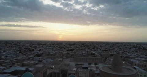 A drone flies over the architectural complex Poi-Kalon among old houses in Stock Footage 255442135