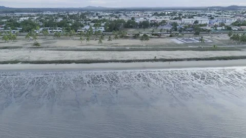 Drone flies over the Atlantic Ocean facing Grand Parc de la Cocoteraie Stockbeeldmateriaal 289040189