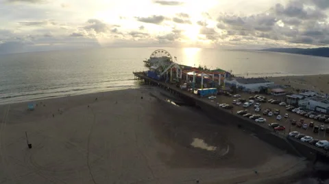 Drone flies over the beach at dusk to Santa Monica Pier 06 Stock Footage 58656719