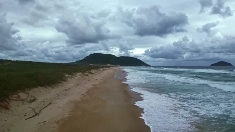 Drone flies over the beach in Florianopolis Video stock 263661126