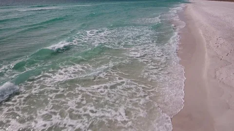 Drone flies over beach shoreline Stock Footage 70114101