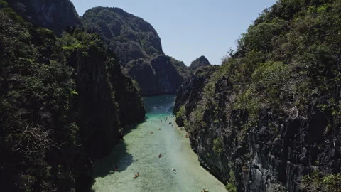 Drone flies over a big lagoon in El Nido Stock Footage 273175911