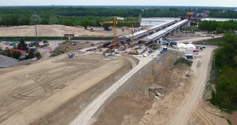 The drone flies over the bridge construction site. Stock Footage 113289058