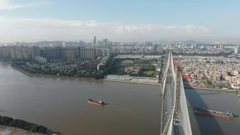 The drone flies over the bridge over the Pearl river Stock Footage 113667202