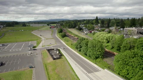 Drone Flies Over Bridge Toward Train in Ridgefield Stock-Footage 276507970