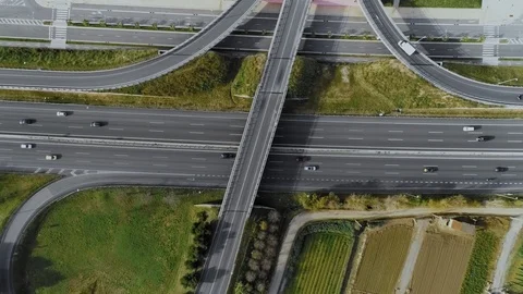 Drone flies over busy junction of highway Video stock 102040799