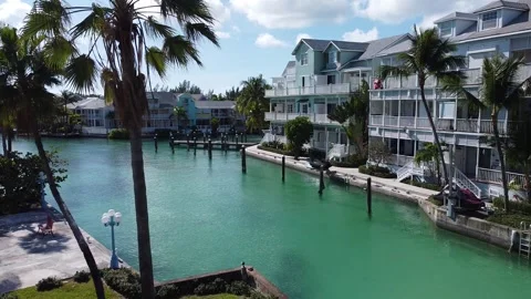 Drone flies over channel toward condos Stock-Footage 257940423