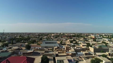 A drone flies over the Chor Minor, the Madrasah of Khalif Niyaz-kul. Old Bukhara Stock Footage 264028536