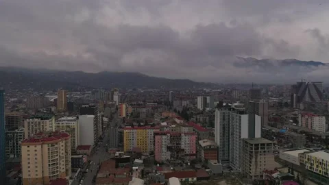 Drone flies over the city in cloudy weather Stock Footage 152379312
