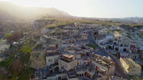 Drone flies over the city in the rocks of Cappadocia. 4k Stock Footage 254703662