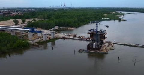 The drone flies over the construction of the bridge and the Warsaw bypass. Stock Footage 113419019