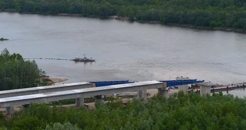 The drone flies over the construction of the bridge and the Warsaw bypass. Stock Footage 113463325
