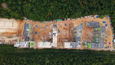 A drone flies over a construction site. Stock Footage 252280331