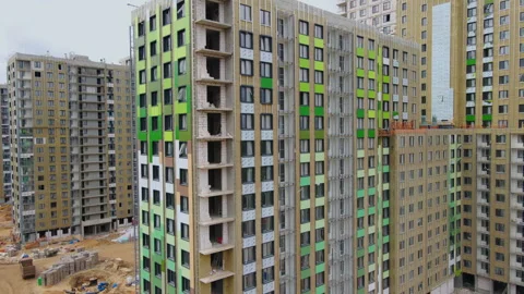 A drone flies over a construction site. Stock Footage 252280605