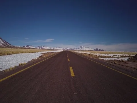 Drone flies over desolate road in northern Chile Stock Footage 83294245