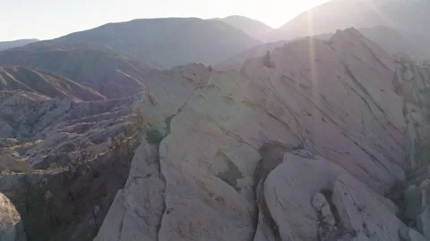 A drone flies over the Devil's Punchbowl, capturing stunning views of the Stock Footage 280129907