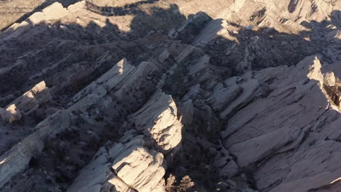 A drone flies over the Devil's Punchbowl, revealing a breathtaking view of Stock Footage 280131573