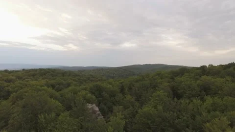 Drone flies over epic limestone rocks. Bright landscape with big rocky boulders. Stock Footage 217486830