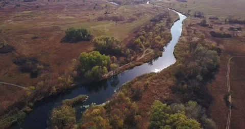 Drone flies over the fields and river Stock Footage 141239696
