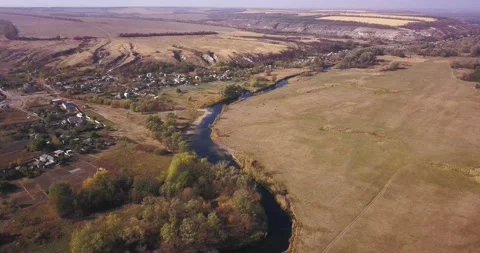 Drone flies over the fields and river Stock Footage 141239780