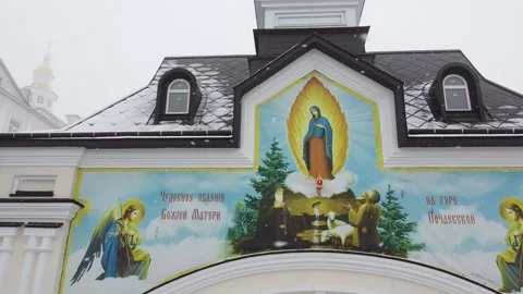Drone flies over the golden domes of the church. snow and fog Stock Footage 180449244