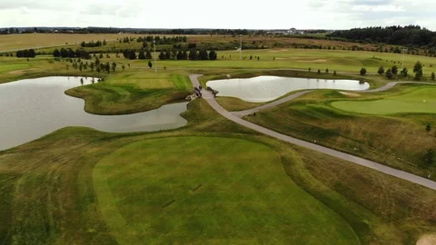 Drone flies over a golf course Stock Footage 121110820