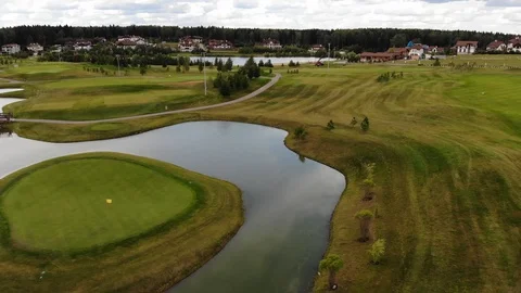 Drone flies over a golf course Stock Footage 121110853