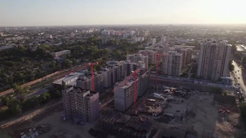 The drone flies over high-rise buildings under construction Stock Footage 277477502