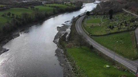 The drone flies over the highway, river and the old catalic cemetery Video stock 234111506