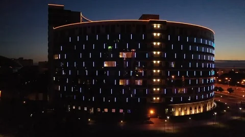 The drone flies over the highway through the night city Stock Footage 110794947