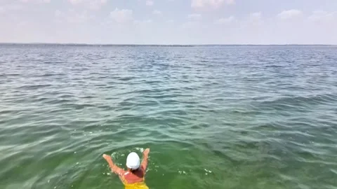 Drone flies over lake Video stock 313506491