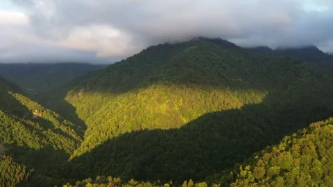 Drone flies over mountain peak revealing panoramic sunset view, Adjara, Georgia 스톡 동영상 337336762