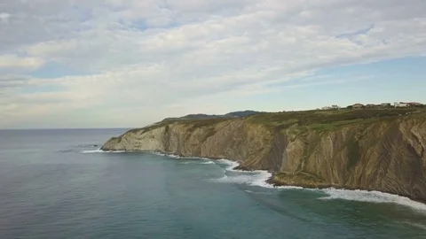 Drone flies over the ocean and rocks 動画素材 81703612