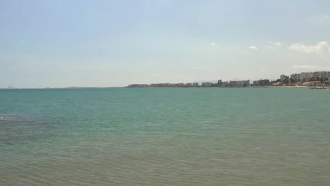 Drone flies over open turquoise waters, a mediterranean coast panorama in view 스톡 동영상 150339745