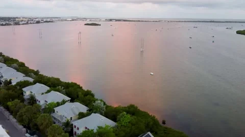 Drone flies over Parrot Key Hotel Villas, capturing Fleming Key and Garrison Stock-Footage 321519550