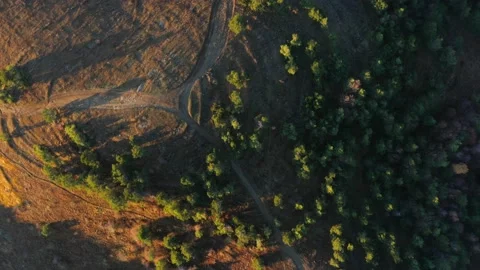 Drone flies over the peak of Mount Demerdzhi in the sunset 動画素材 168282887
