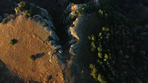 Drone flies over the peak of Mount Demerdzhi and turns camera to the clouds Video stock 168283129