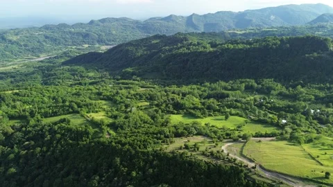 Drone Flies Over Plains and Rising Mountain Relief at Golden Hour, Georgia Stock Footage 339357777