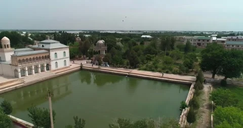 Drone flies over the pool of Sitorai Mohi-Hosa Palace Stock Footage 307988669