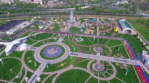 A drone flies over a public amusement park. Sunny day Stock Footage 271187853